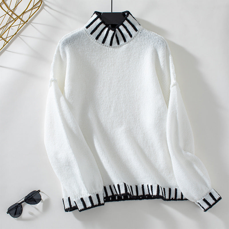 Ladies fashionable pullover with high collar and contrasting cuffs