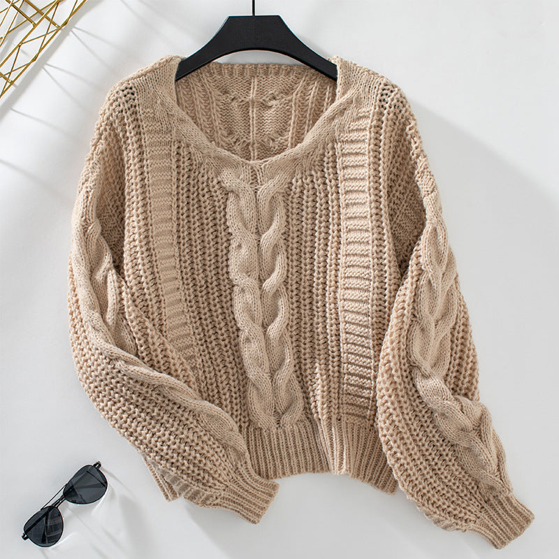 Ladies chunky knit pullover with oversized cut and cable pattern