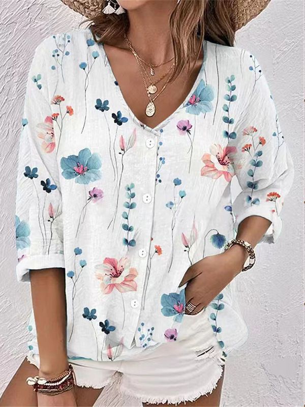 Women's blouse with floral print and modern button design
