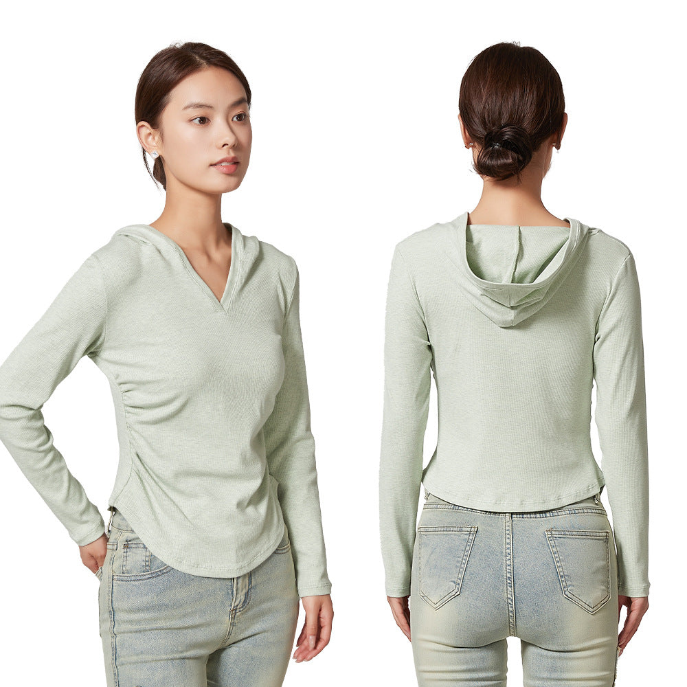 Ladies sporty top with hood and fitted cut