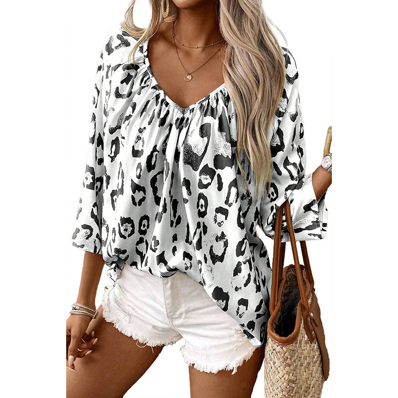 Ladies blouse top with a loose fit and chic leopard print