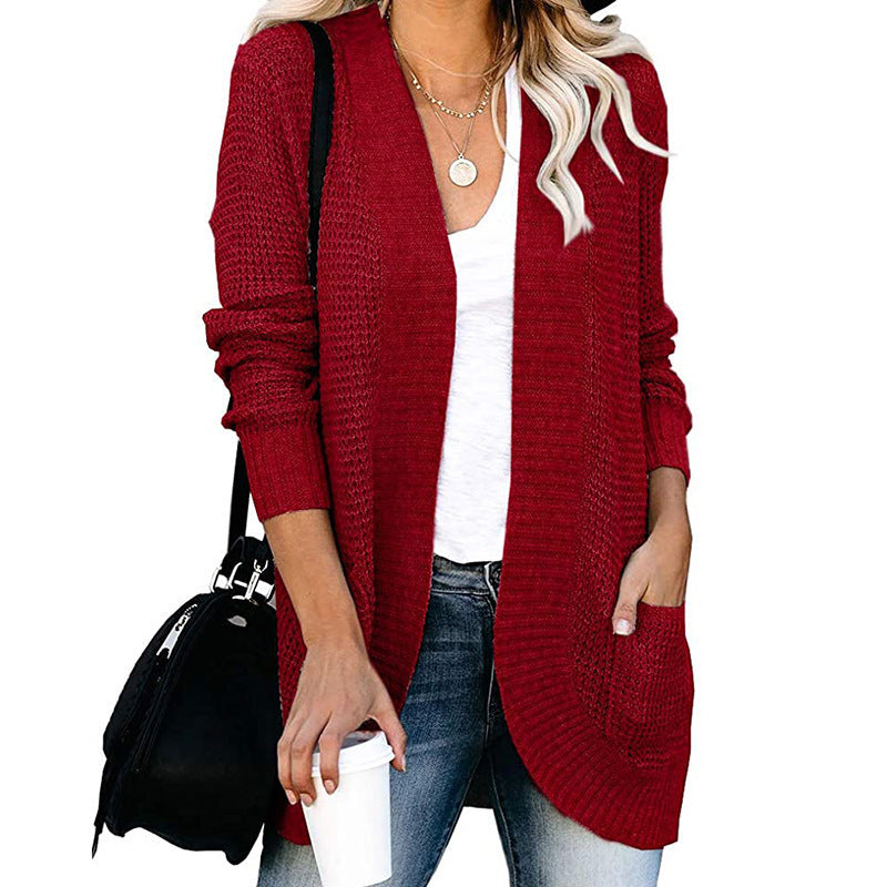 Women’s cardigan with open cut and side pockets