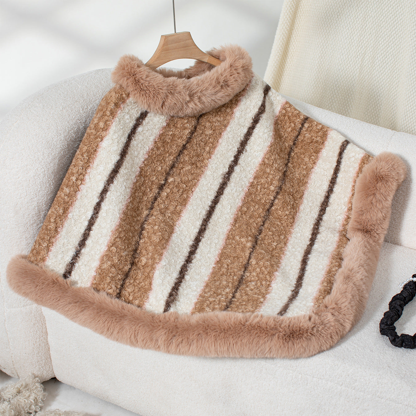 Ladies elegant poncho with luxurious fur trim
