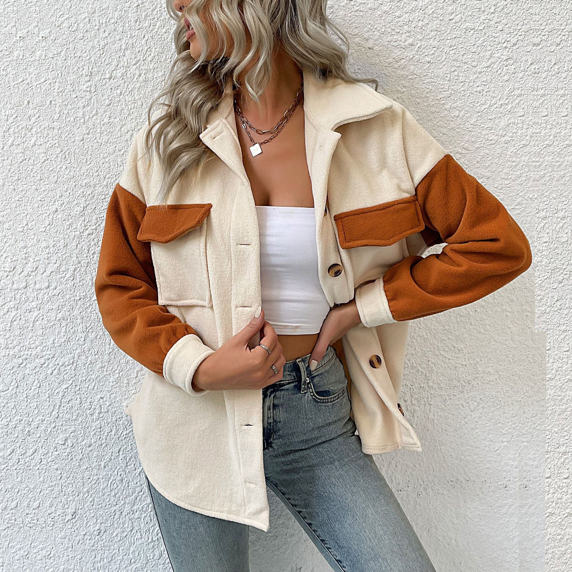 Ladies fashionable transitional jacket with pockets and contrasting sleeves
