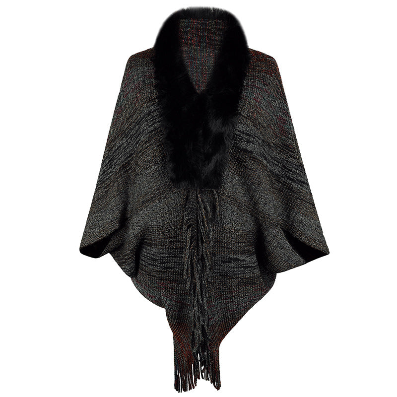 Women elegant poncho with luxurious faux fur collar and fringed hem
