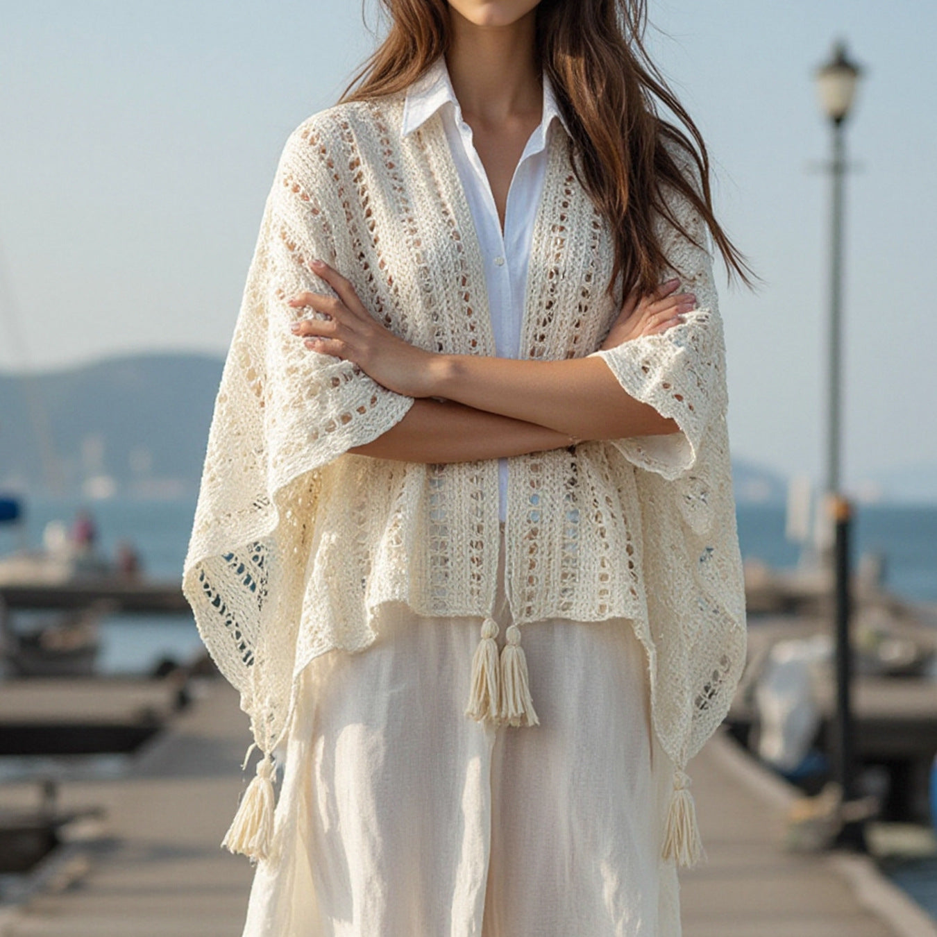 Ladies airy knit poncho with fringes
