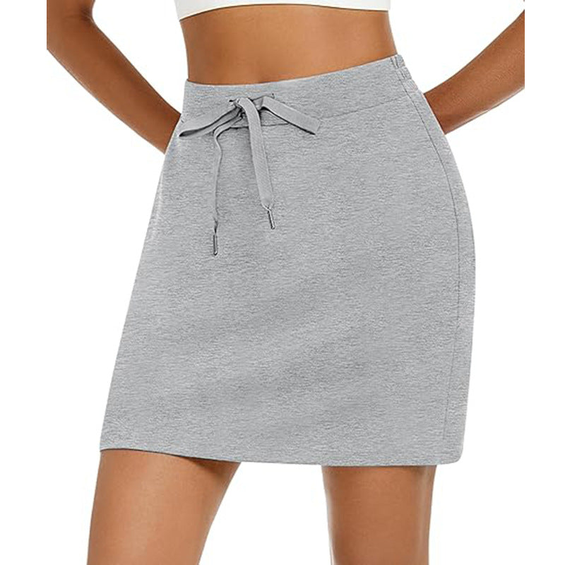 Women's sporty mini skirt with adjustable drawstring and side pockets