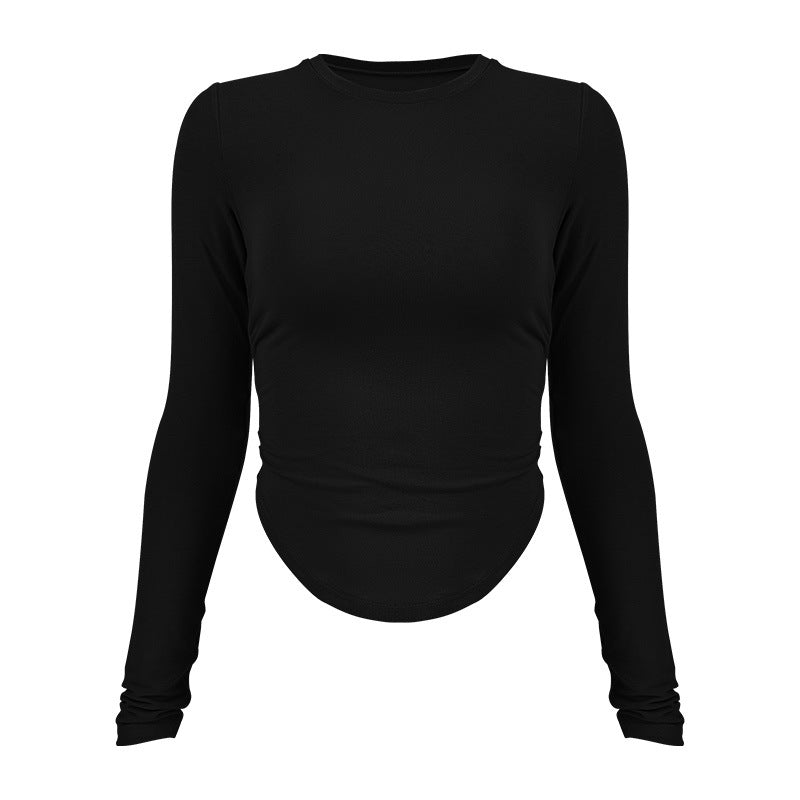 Ladies long-sleeved functional top with stylish gathering elements and figure-hugging cut