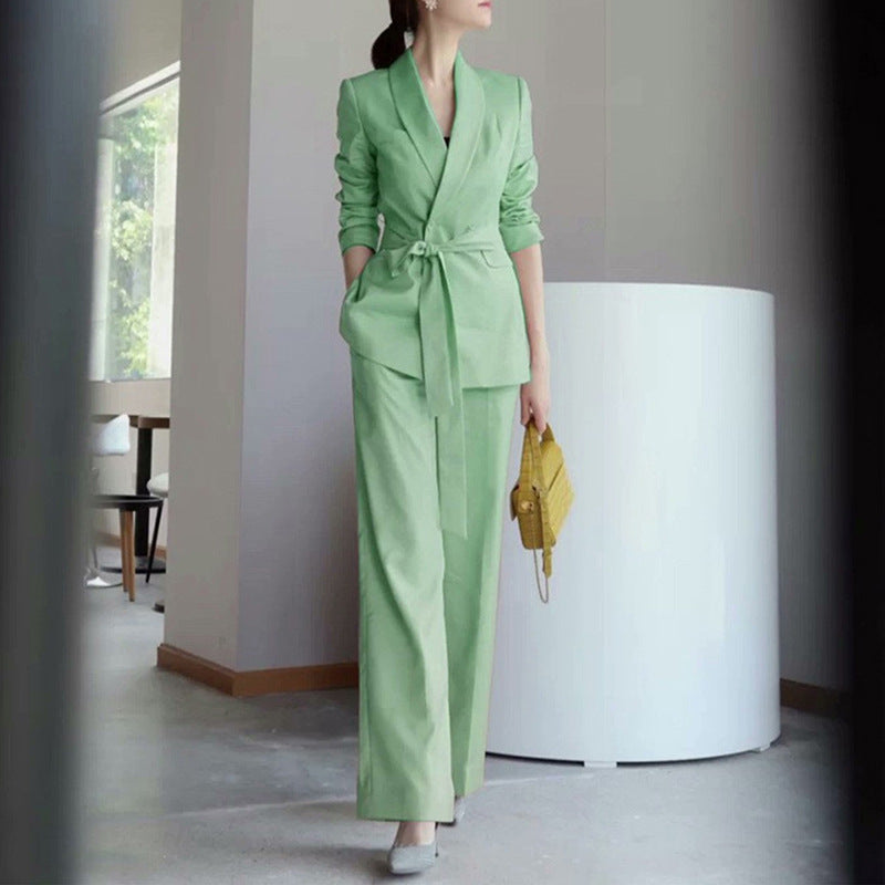 Women elegant tailored blazer and wide trouser suit