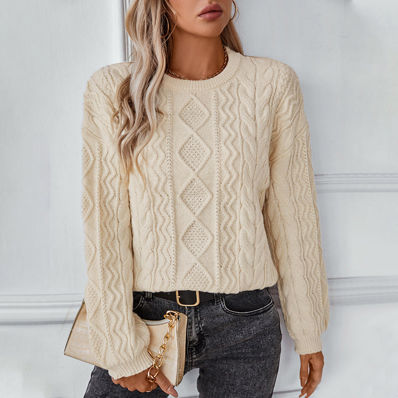 Women's chunky knit pullover with textured cable pattern