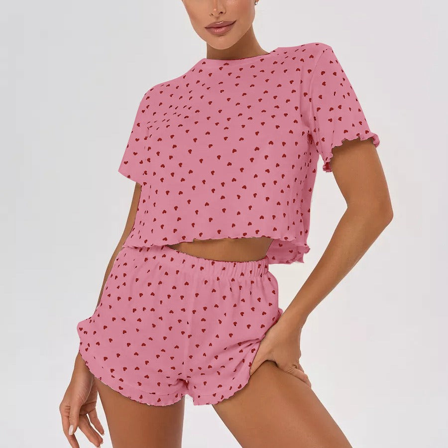 Women's pajama set with playful heart motif and elastic waistband