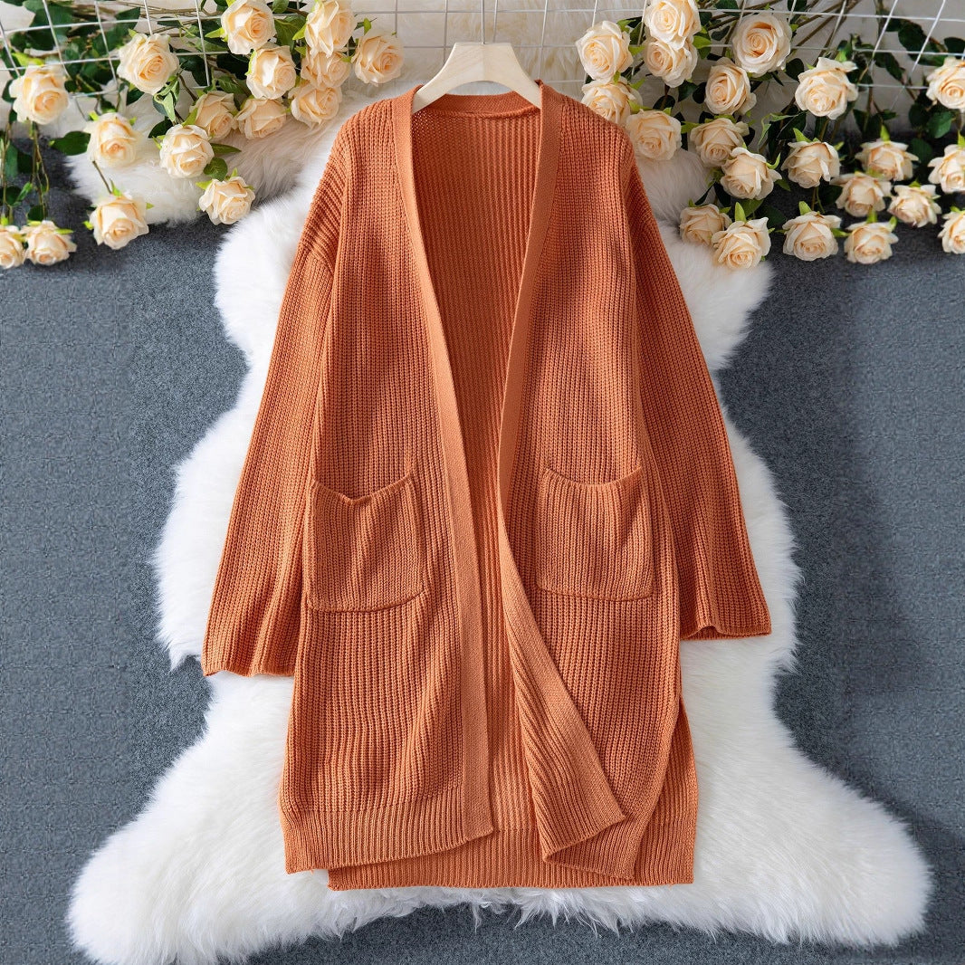 Women's airy cardigan with practical pockets and loose fit