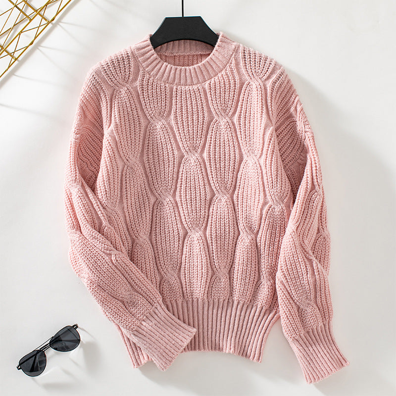 Women’s knit pullover with decorative cable design and comfortable fit