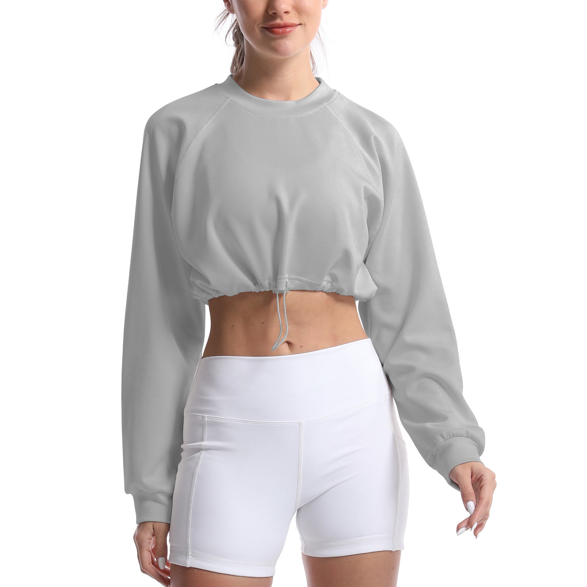 Women's sporty crop pullover with adjustable hem and long sleeves