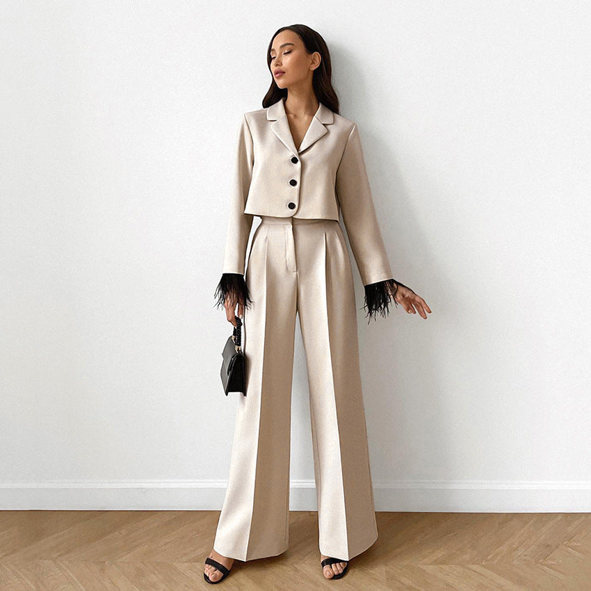 Ladies chic suit set with elegant feathers at the sleeves and high waistband