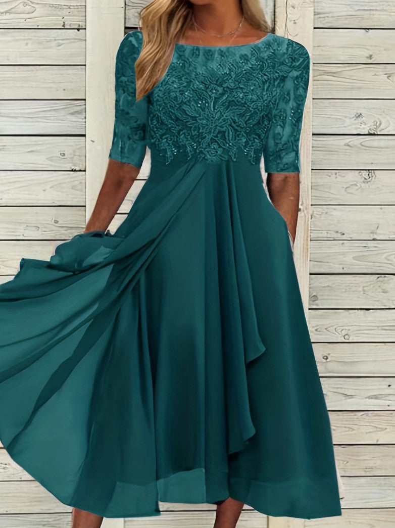 Women's elegant cocktail dress with floral lace top and flowing skirt