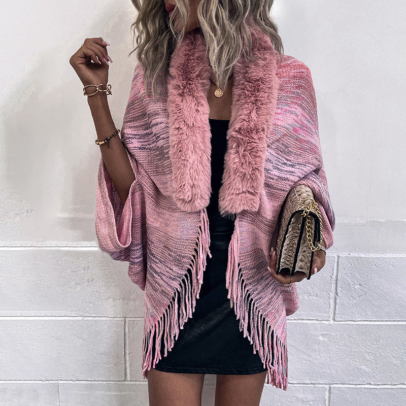 Women elegant poncho with luxurious faux fur collar and fringed hem