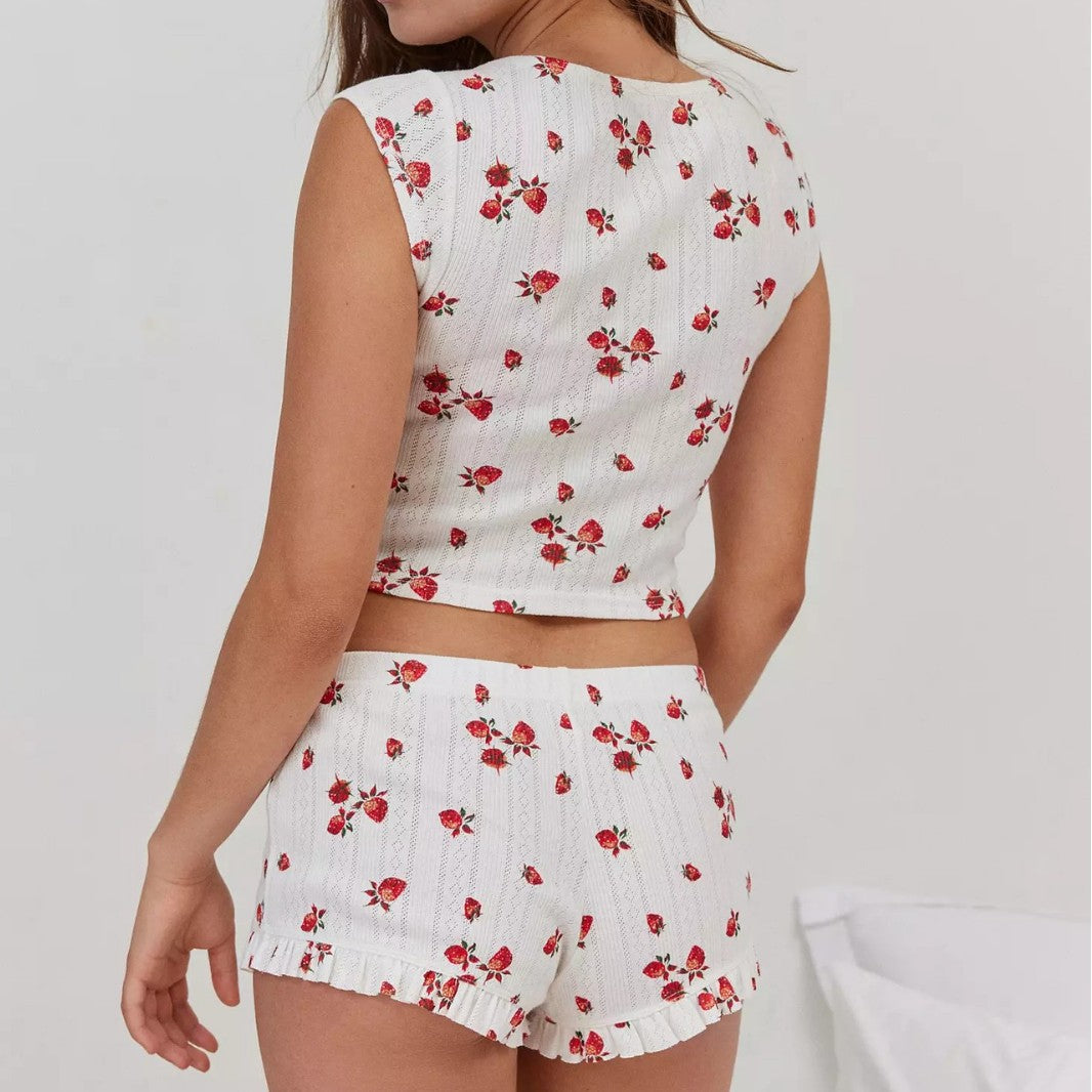 Women's pajama set with floral design and ruffle trim