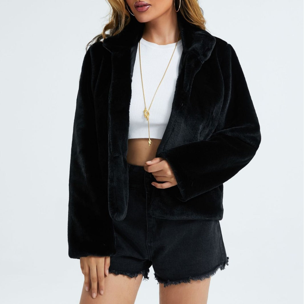 Ladies stylish short jacket made of the softest faux fur with wide lapels
