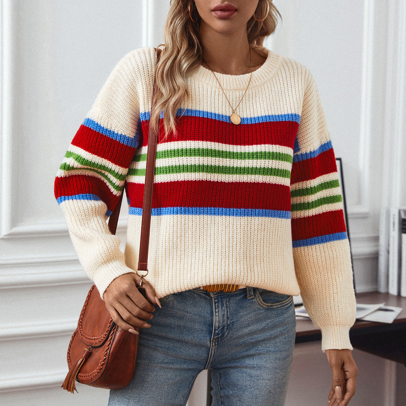 Ladies loose knit pullover with colorful block stripes and round neckline