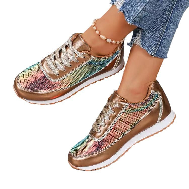 Ladies fashionable sneakers with shimmering upper material and non-slip sole