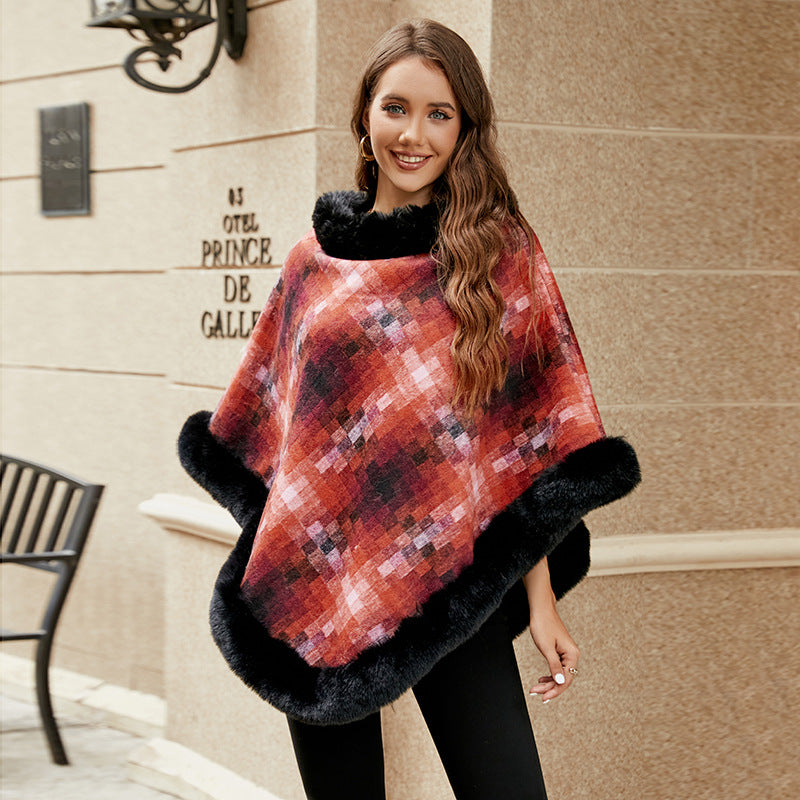Ladies fashionable poncho with luxurious faux fur collar
