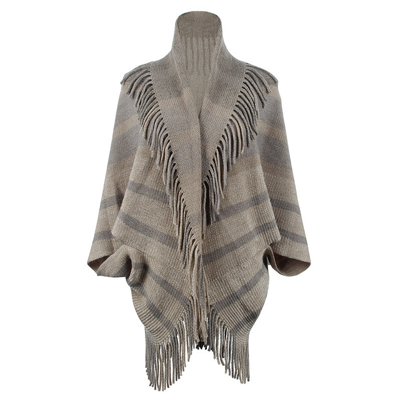 Women’s fashionable knitted poncho with casual fringe design and elegant structure