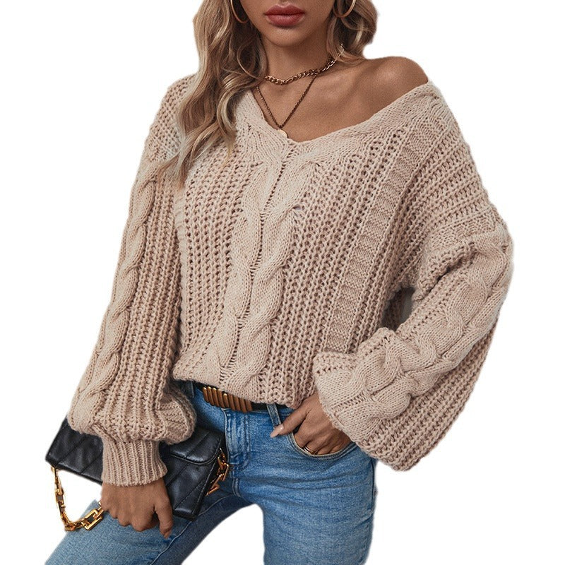Ladies chunky knit pullover with oversized cut and cable pattern