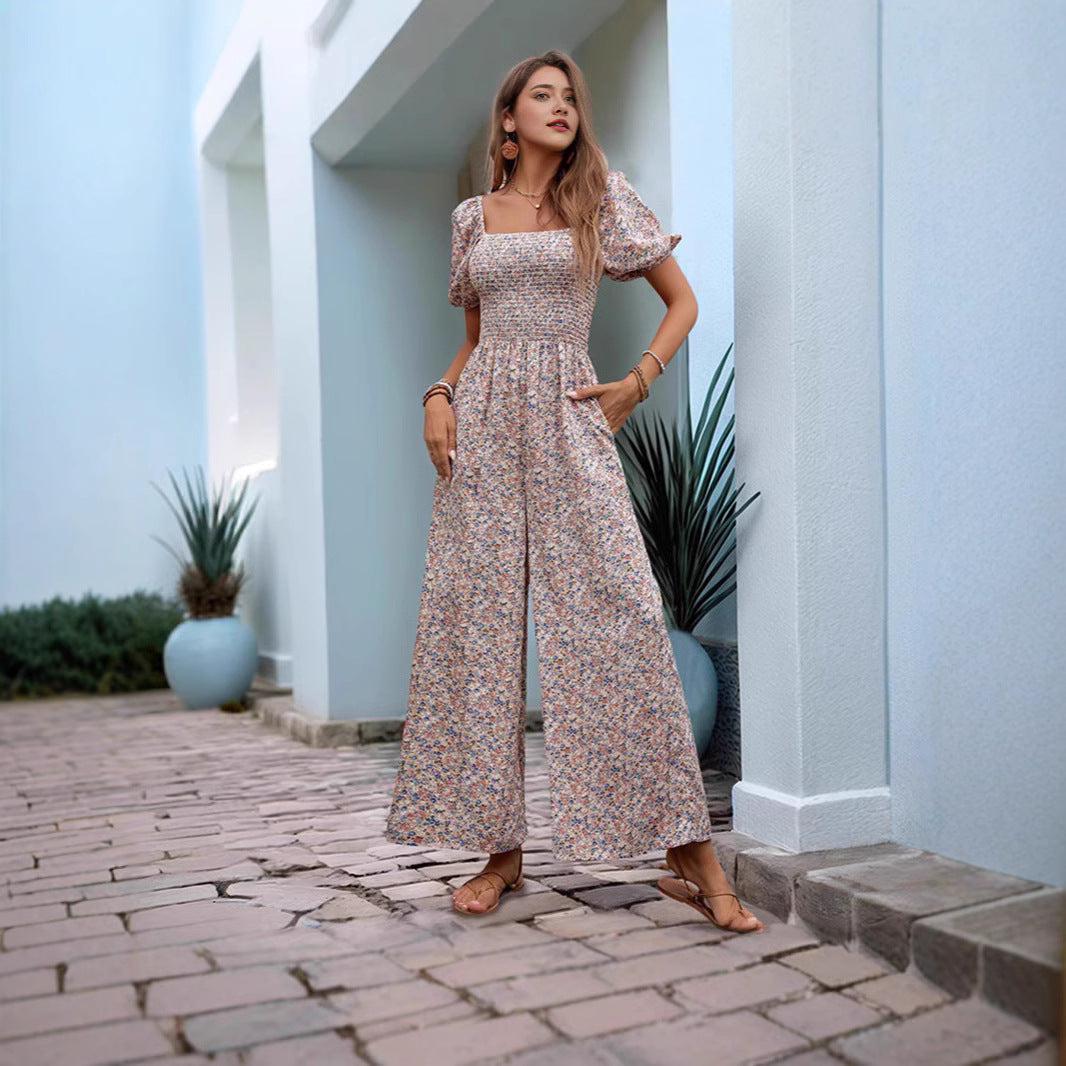 Women's floral patterned jumpsuit with puff sleeves and side pockets