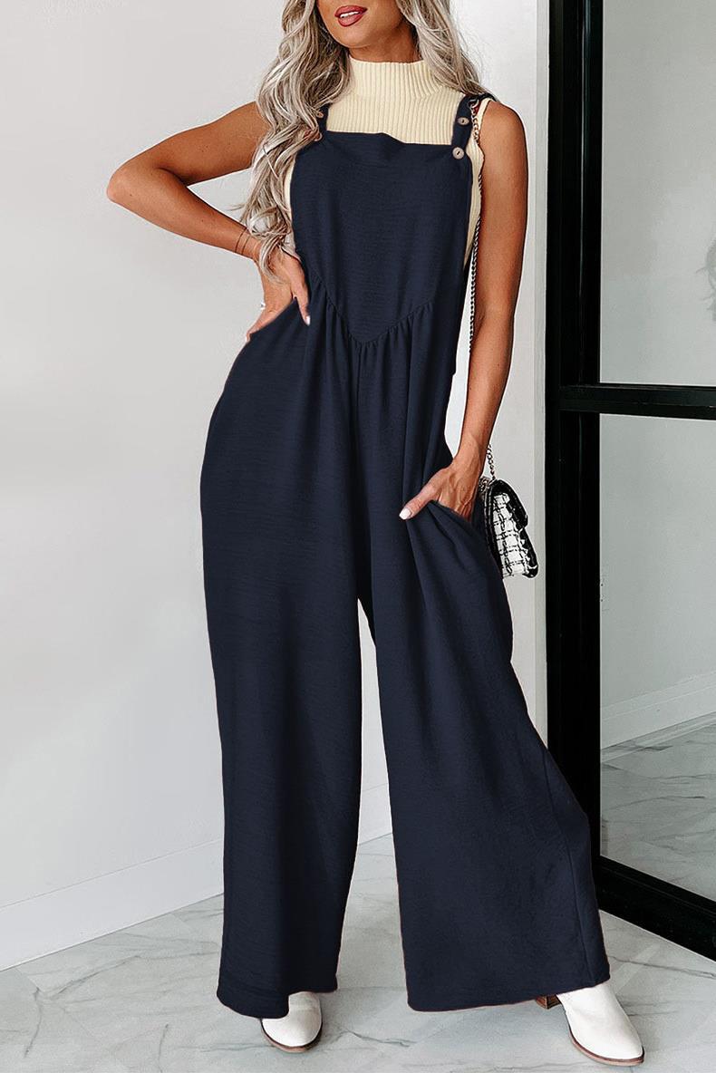 Women’s casual jumpsuit with wide cut legs and decorative button details