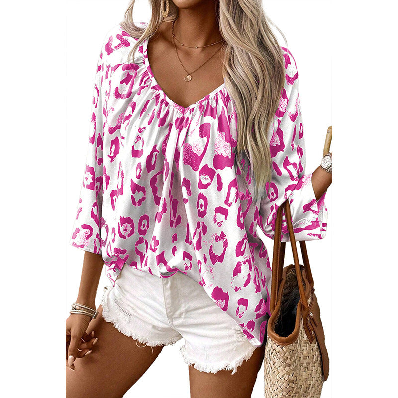 Ladies blouse top with a loose fit and chic leopard print