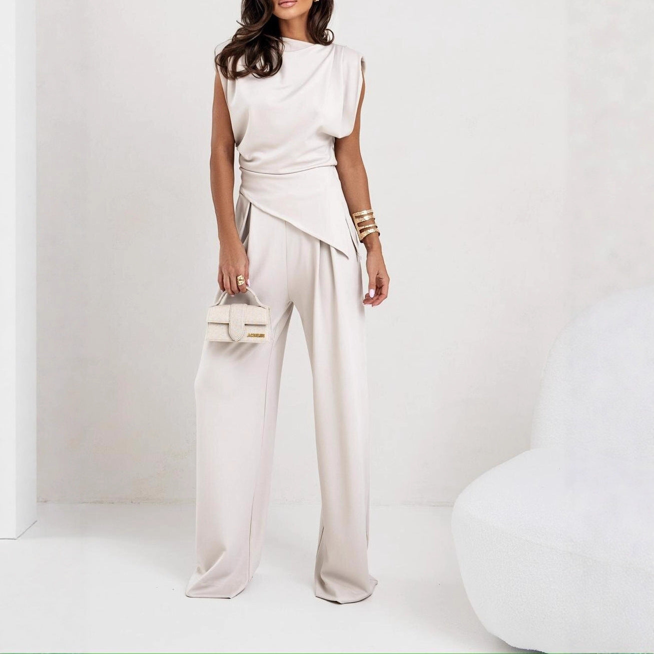 Women's elegantly cut jumpsuit with asymmetric design and wide leg