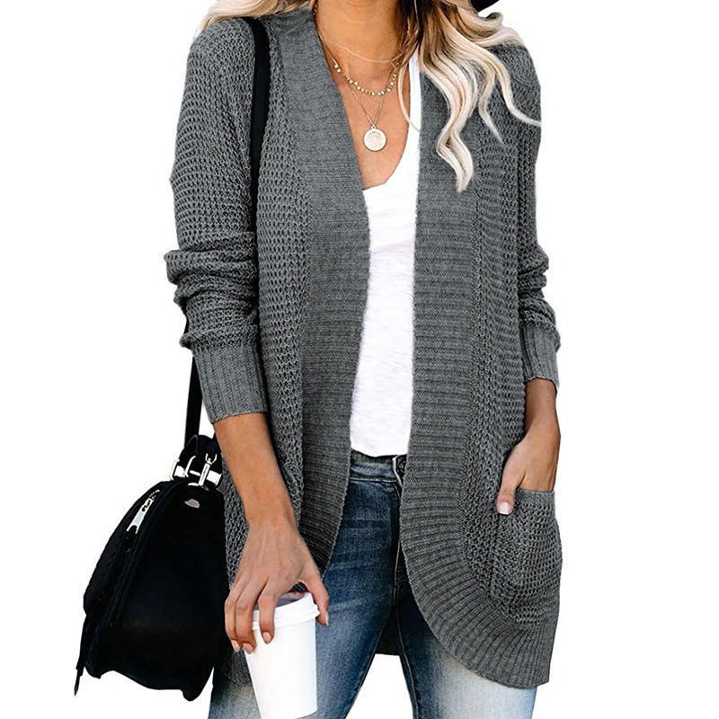 Women’s cardigan with open cut and side pockets