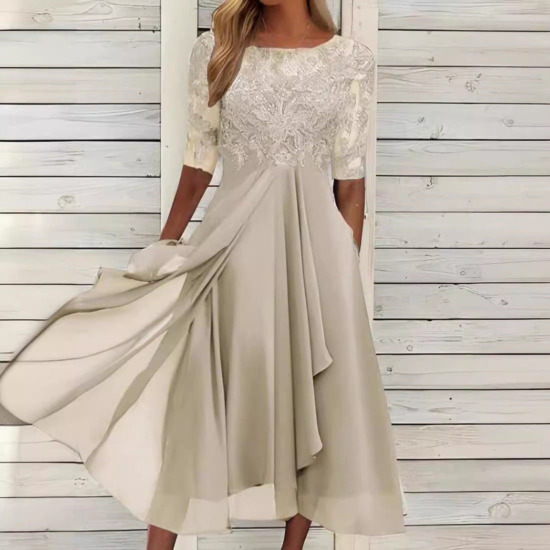 Women's elegant cocktail dress with floral lace top and flowing skirt