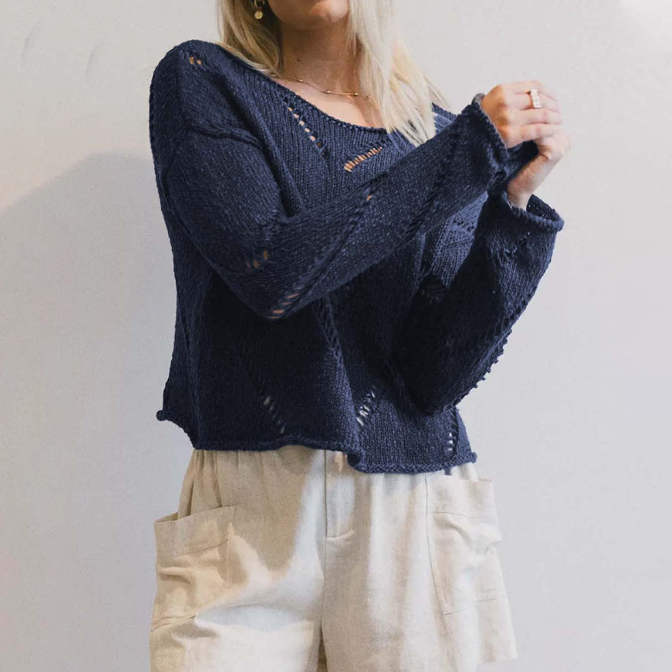 Women's casual knit pullover with airy stitch structure