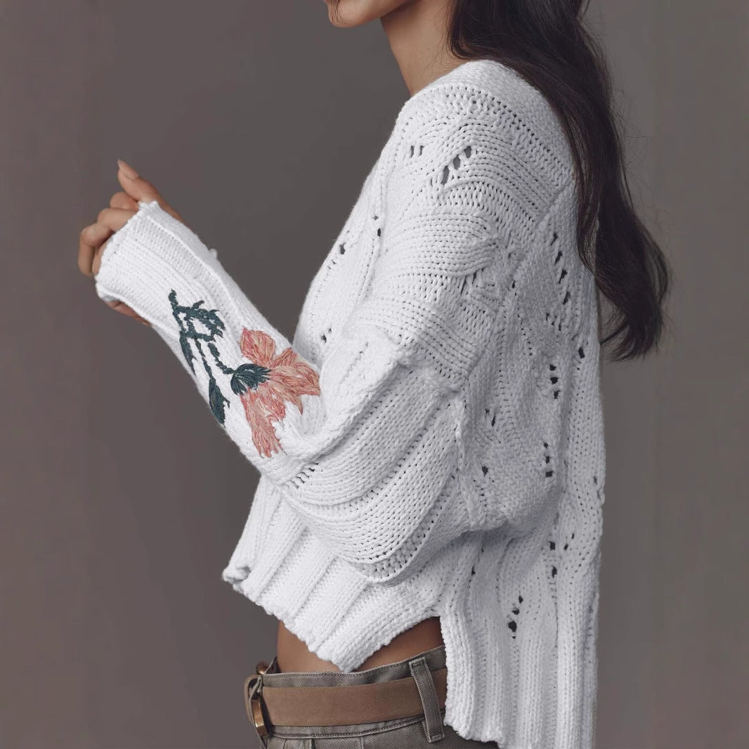 Women's knitted pullover with floral design and V-neck