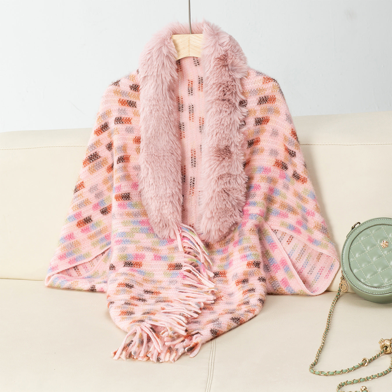 Ladies elegant poncho with luxurious faux fur collar and fringes