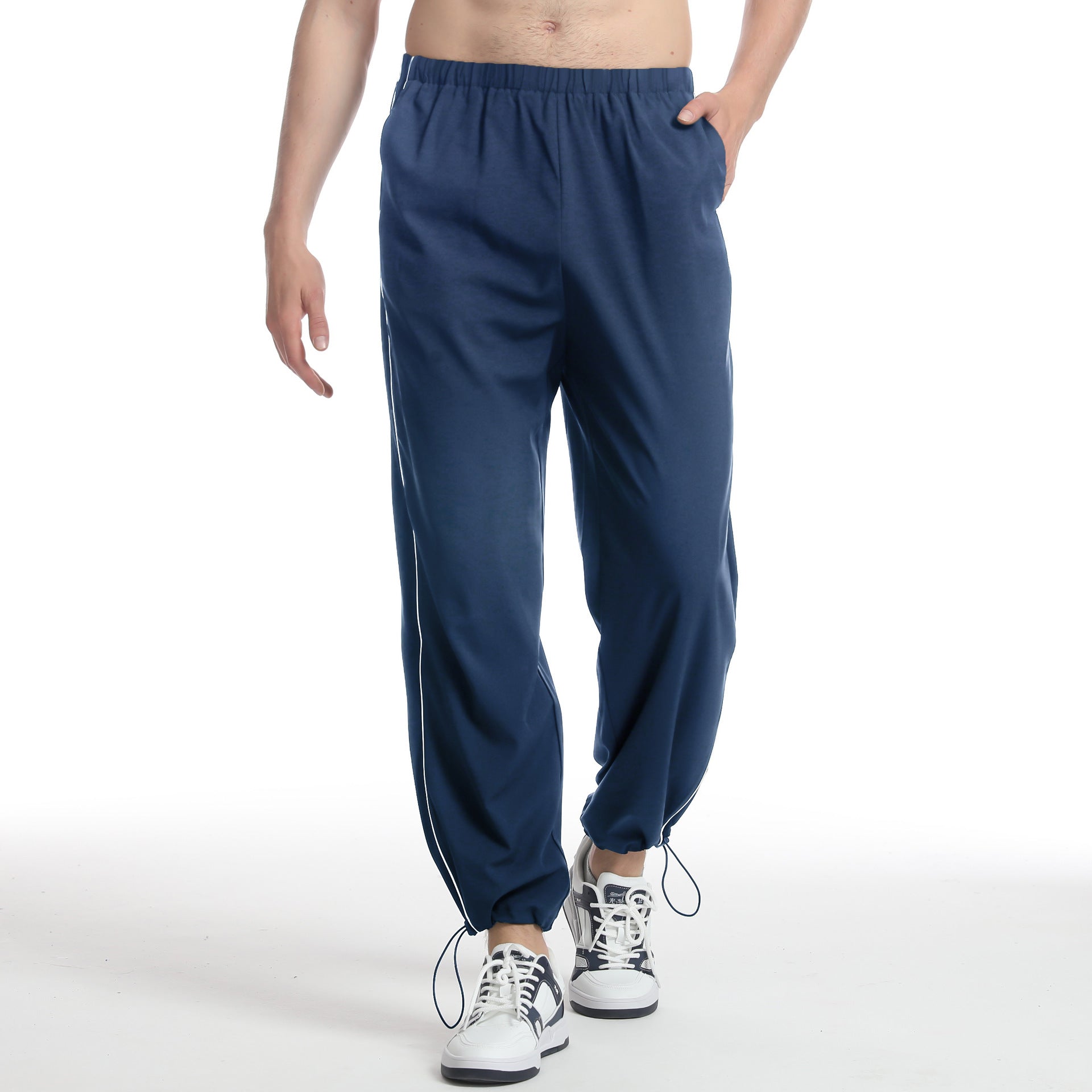 Men's sporty jogging pants with elastic waistband and side zippers