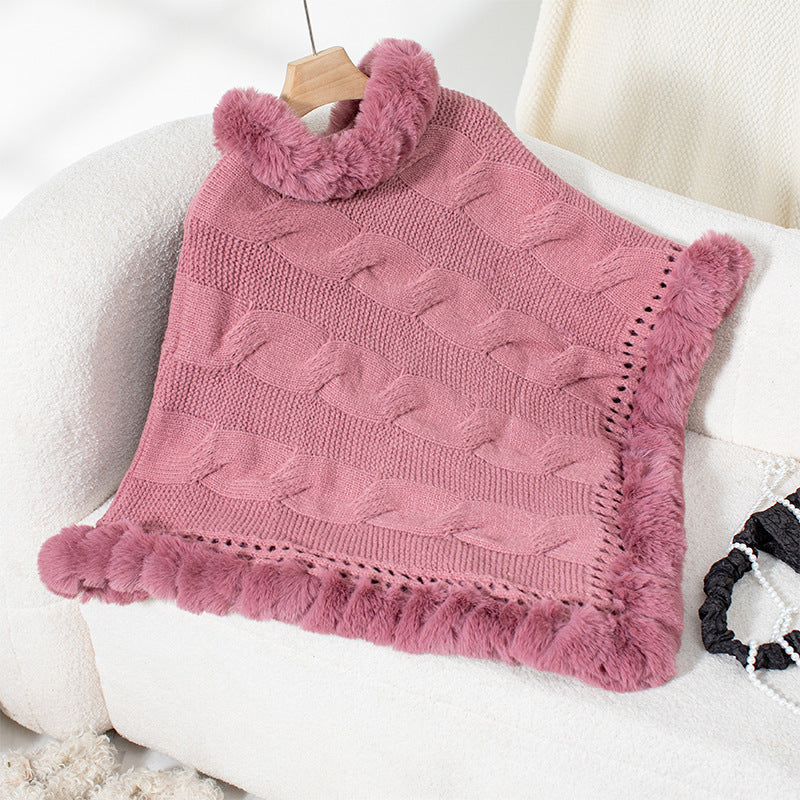 Women's cozy knit poncho with soft faux fur trim and cable knit pattern