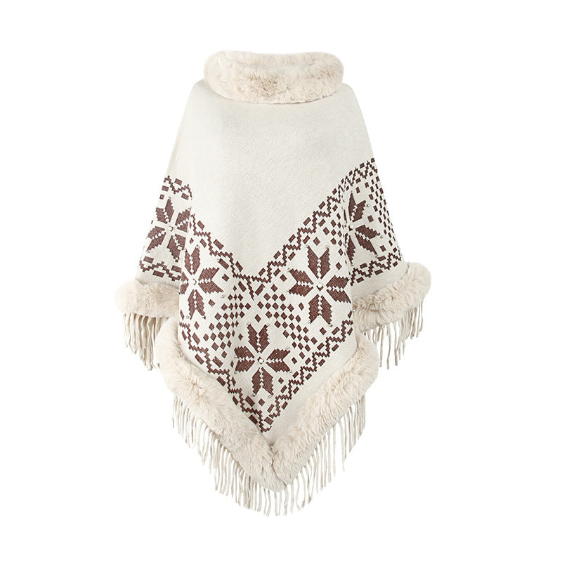 Ladies elegant poncho with decorative fringe design and faux fur trim