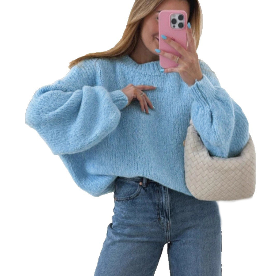 Women's cozy pullover with voluminous sleeves and textured design