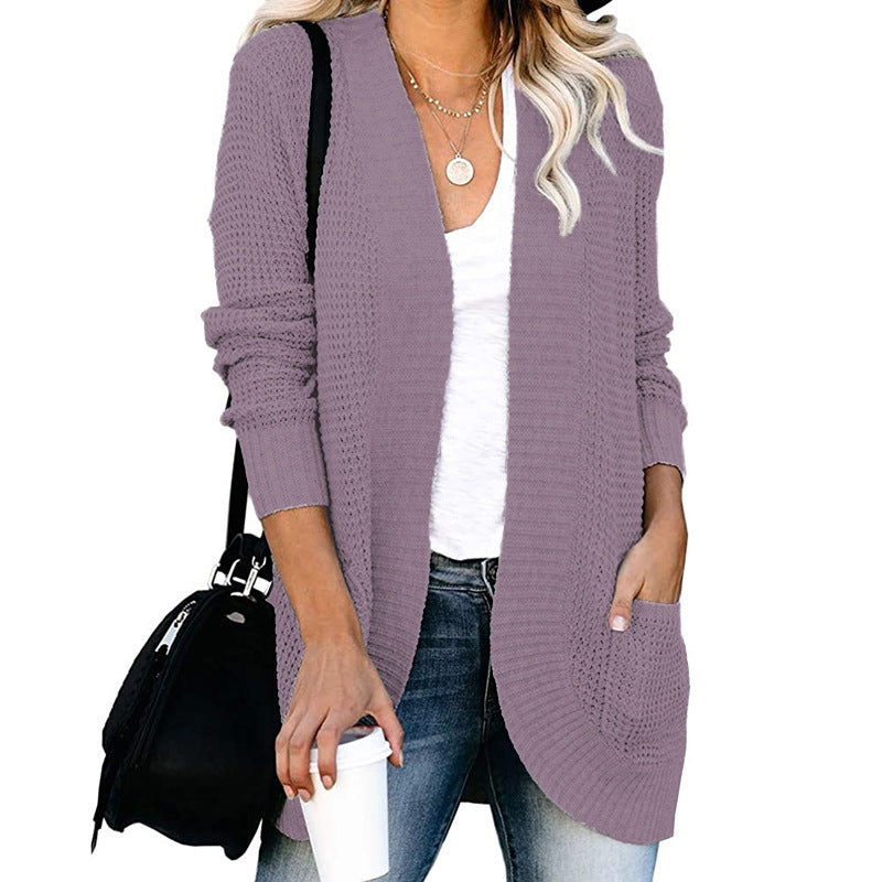 Women’s cardigan with open cut and side pockets