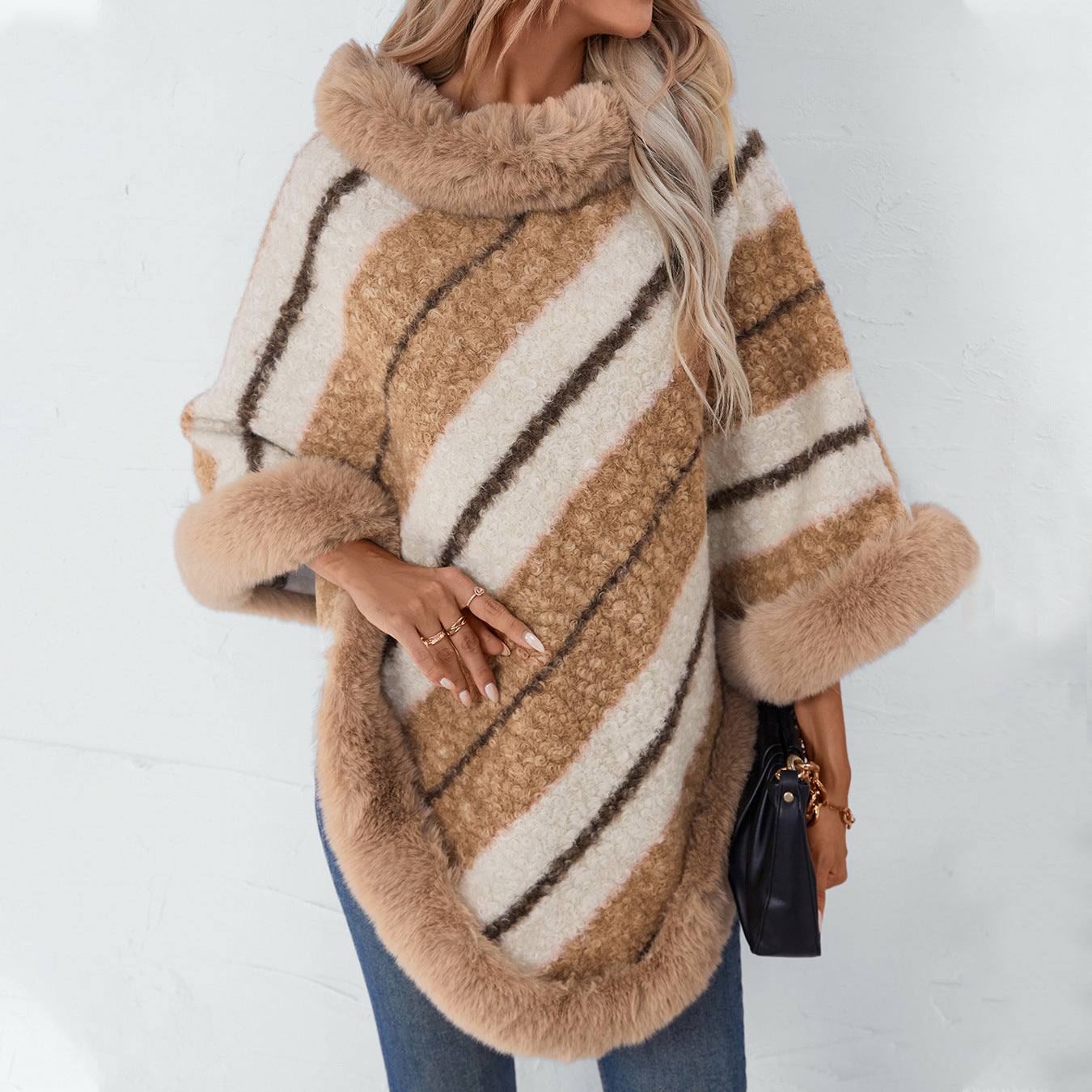 Ladies elegant poncho with luxurious fur trim