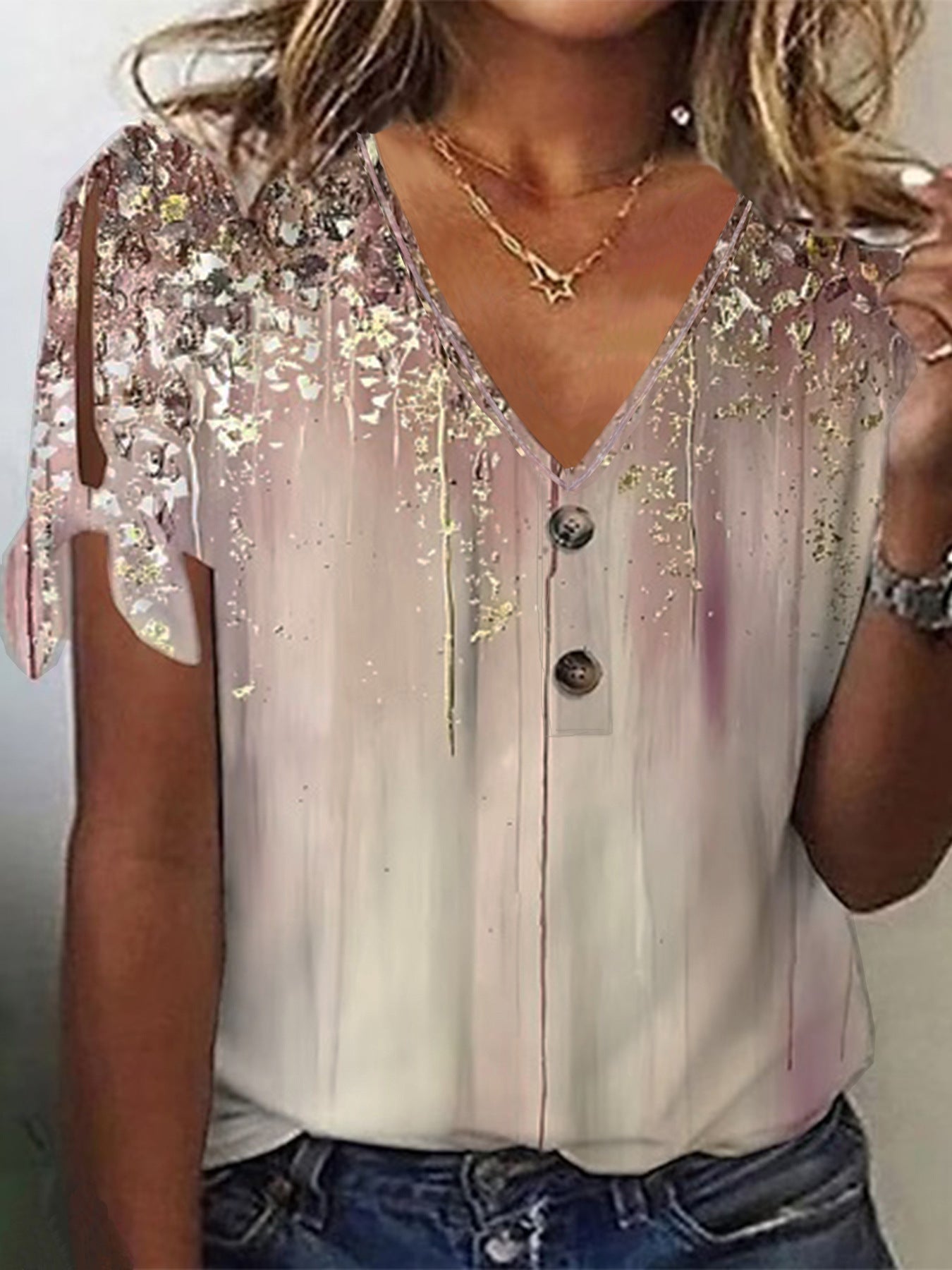 Women's V-neck blouse with decorative buttons and casual sleeves