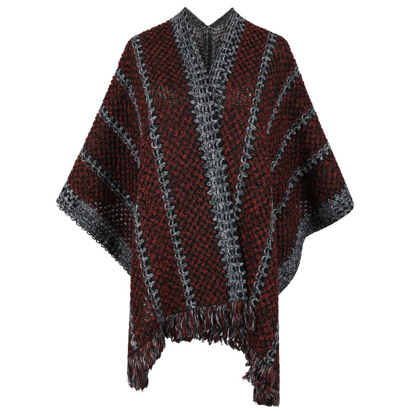 Women's knit poncho with V-neck and fringes