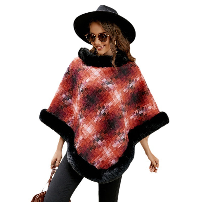 Ladies fashionable poncho with luxurious faux fur collar