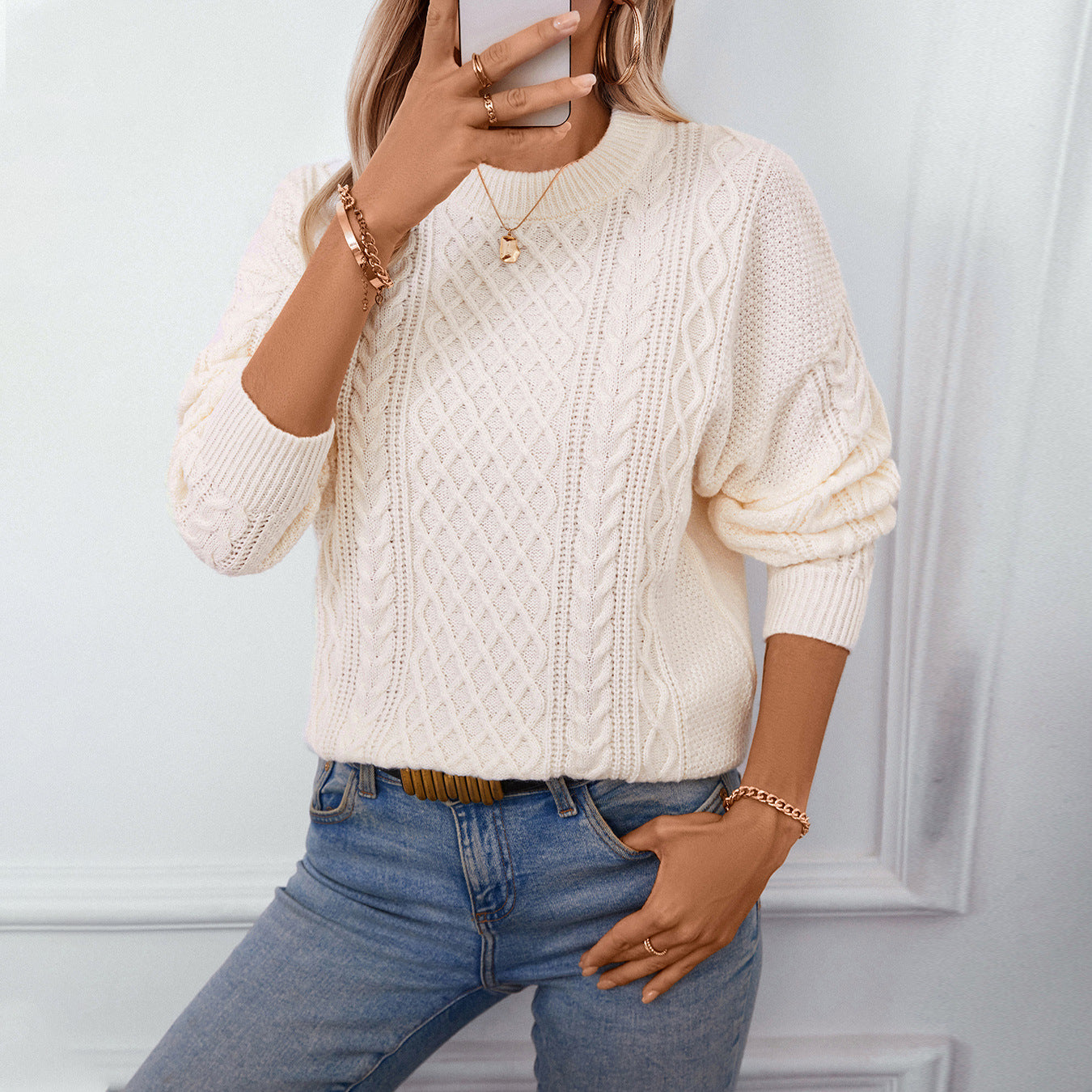 Ladies chunky knit pullover with sophisticated cable pattern and round neckline