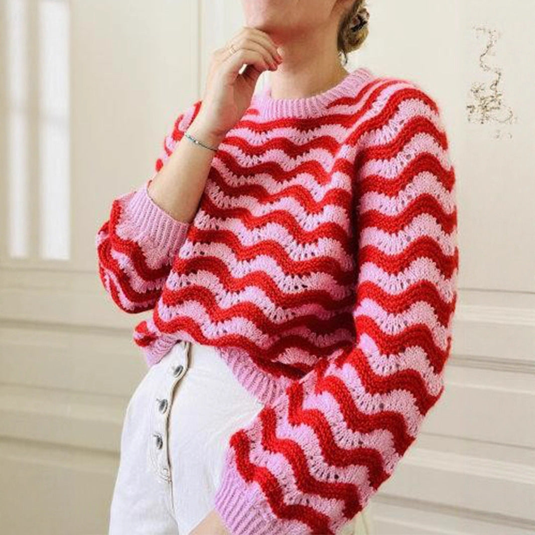 Women's knitted pullover with wave pattern and generous cut