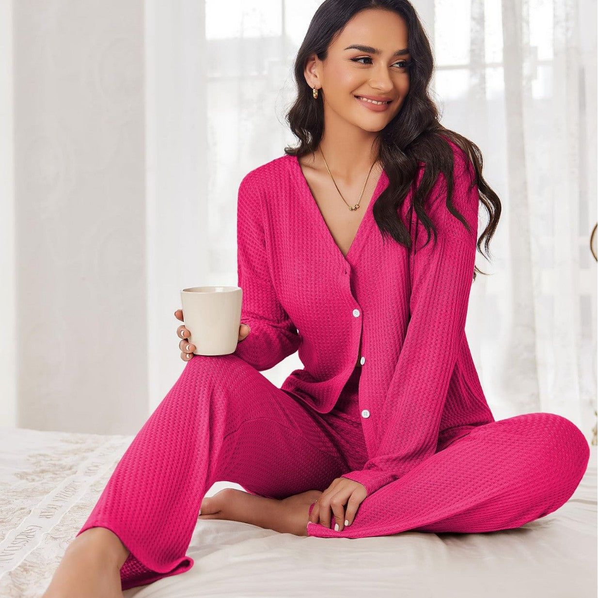 Women's pajama set with long sleeves and button placket