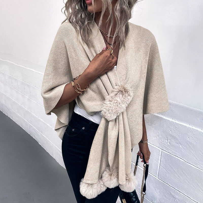 Ladies elegant poncho with luxurious faux fur trim
